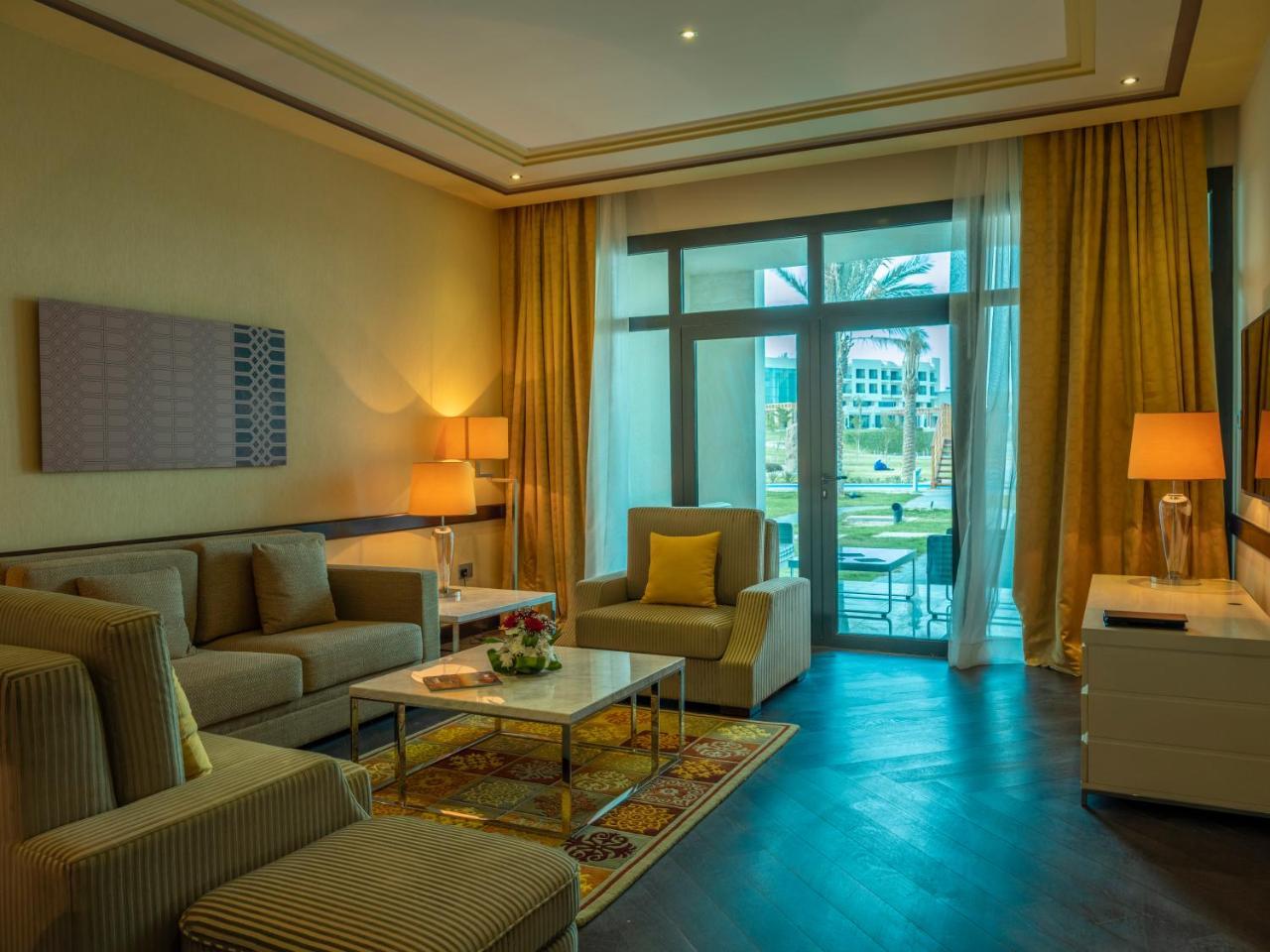 Retaj Salwa Resort & Spa ドーハ エクステリア 写真 A living room at the hotel